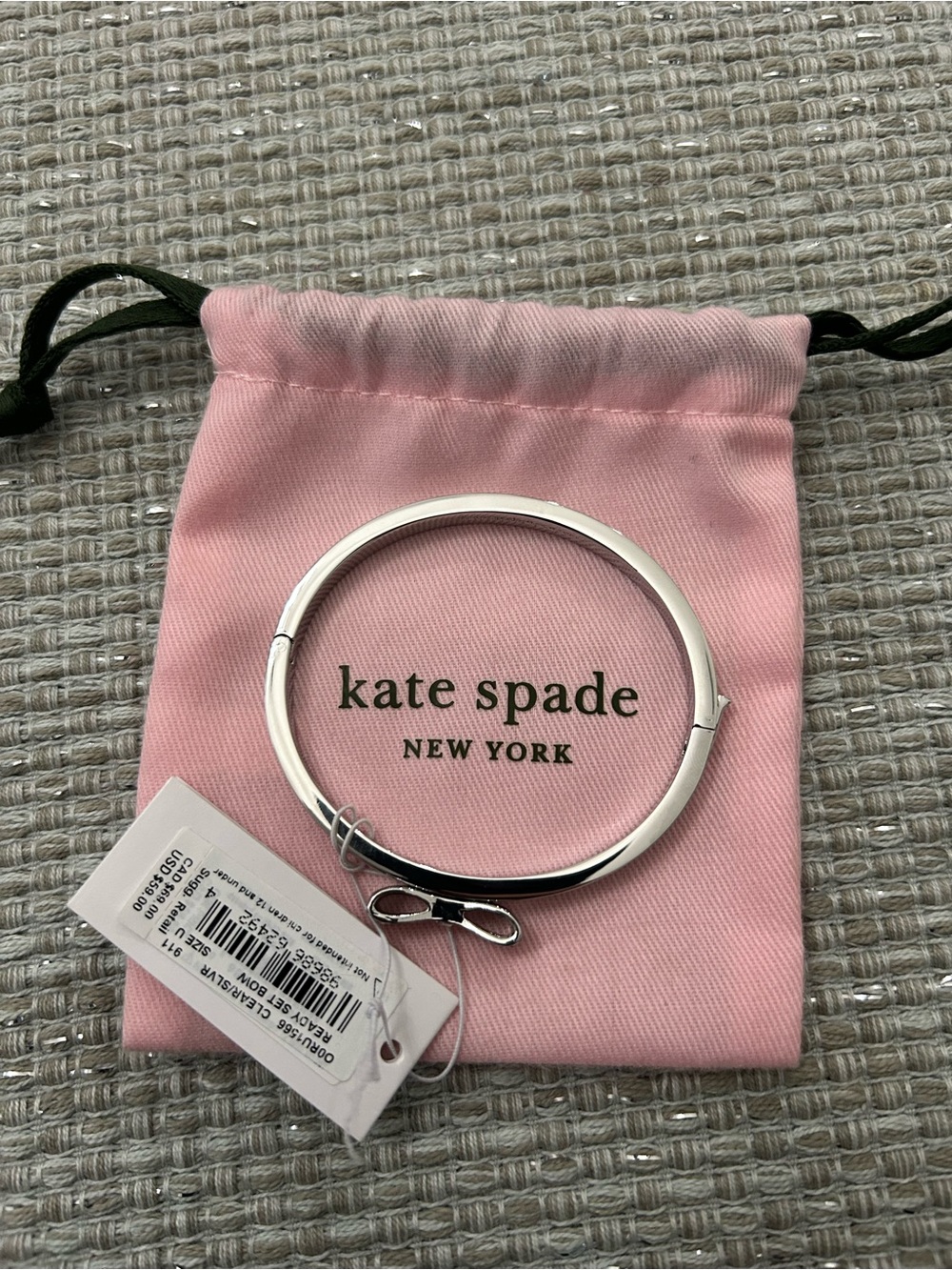 Kate Spade New York Ready Set Bow Pavé Bangle in Clear/Silver